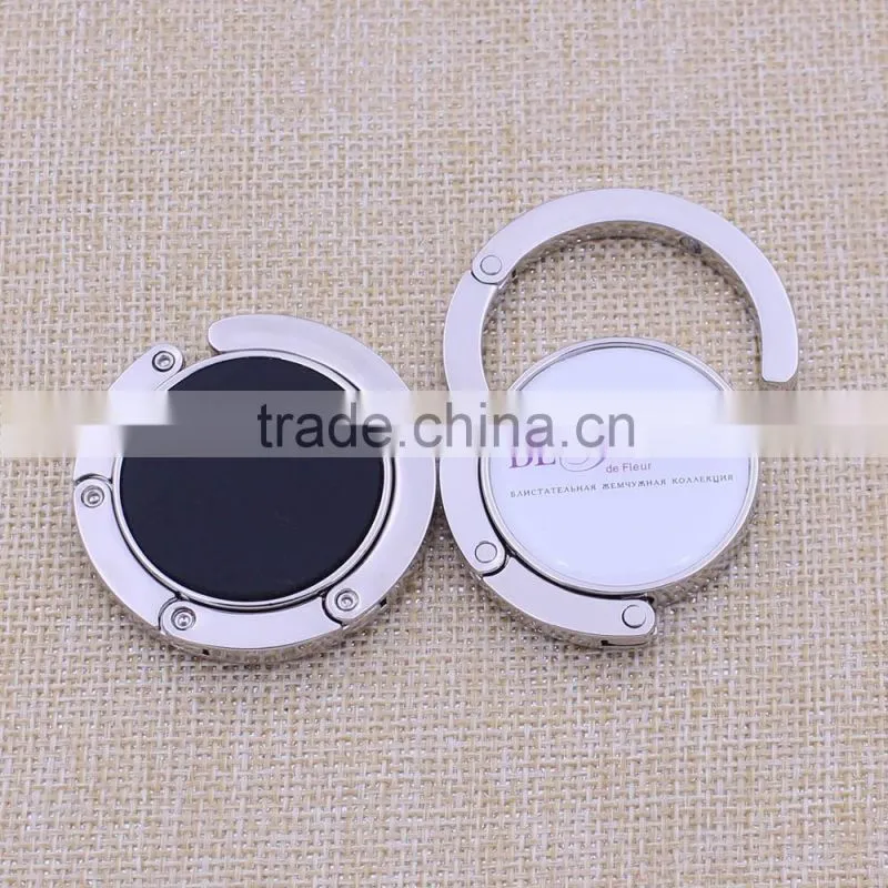 Customized logo promotion round foldable bag hanger / holder with epoxy sticker
