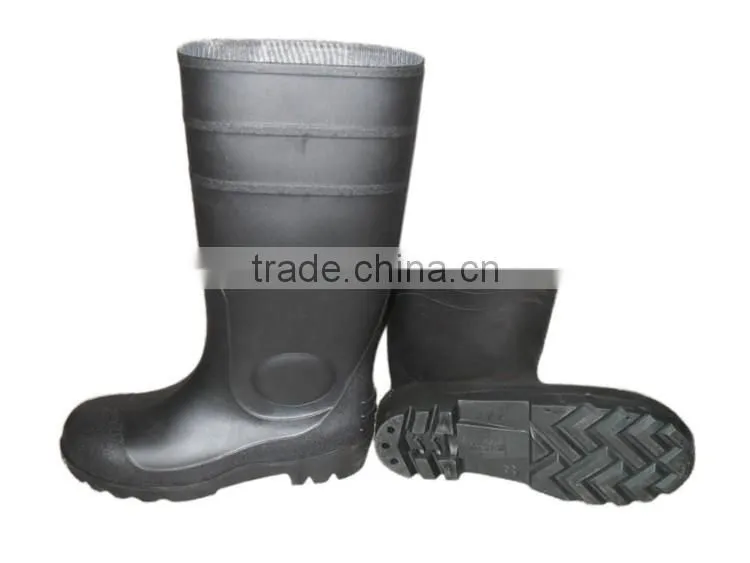 White PVC rain boots with steel toe