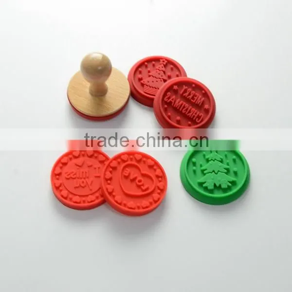 Silicone stamp cake tool with wooden handle