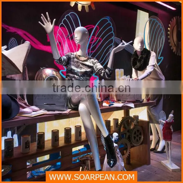 Life size fiberglass female mannequins with acrylic fluorescent wings