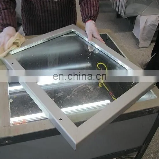 frost free freezer defrost automatically heated glass
