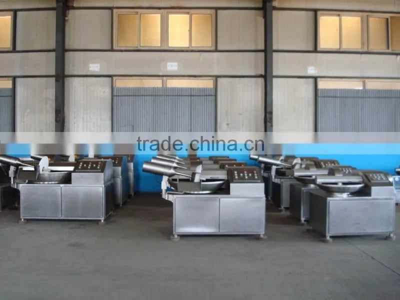 Meat cutting and blending machine
