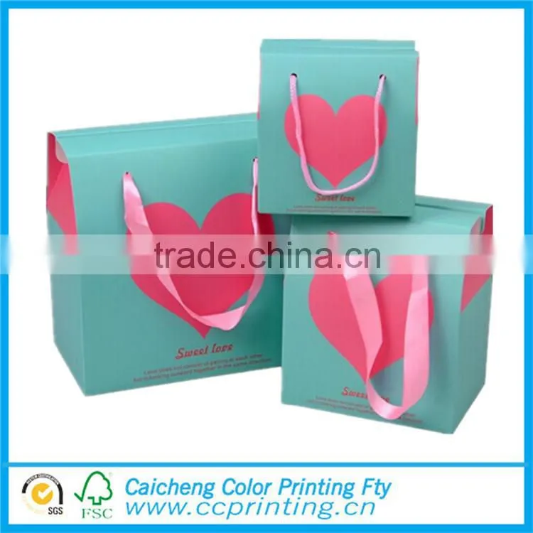 Promotional wedding gift paper bag with heart window