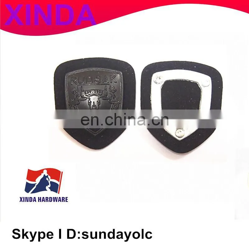 leather patches with custom hardware for garment