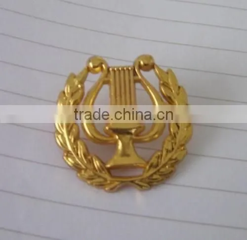safety pin badge, school emblem, national emblem; school badge