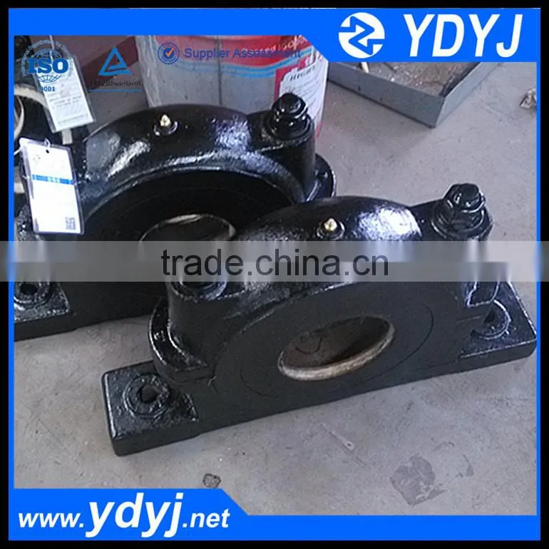 High performance bearing housing seat for bulk materials conveyor
