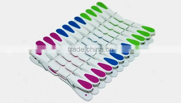 packed into plastic basket new material hanging colored peg for clothes