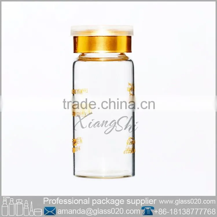 clear glass vial with cap and inner