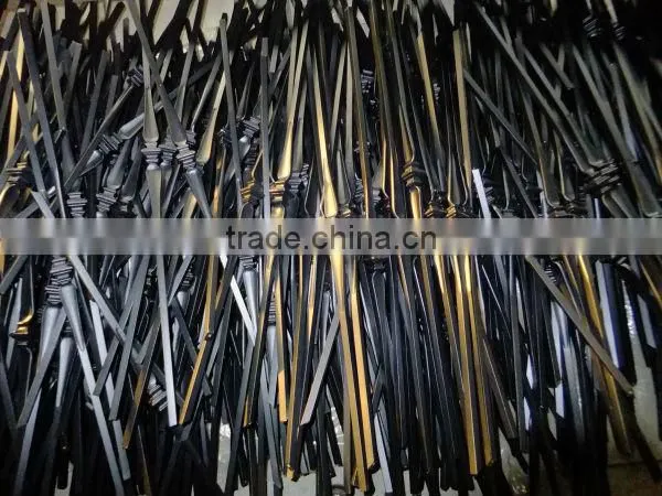wrought iron bars and fence pickets
