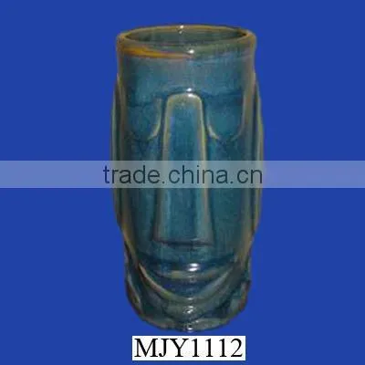ceramic tiki pot