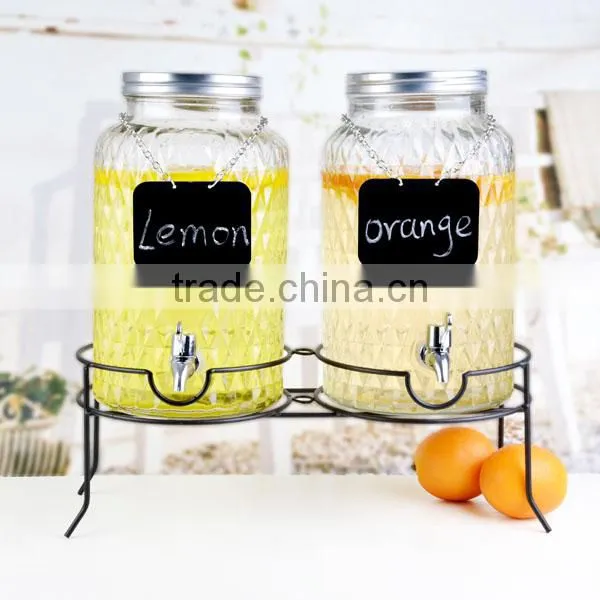 glass jar with tap with metal stand