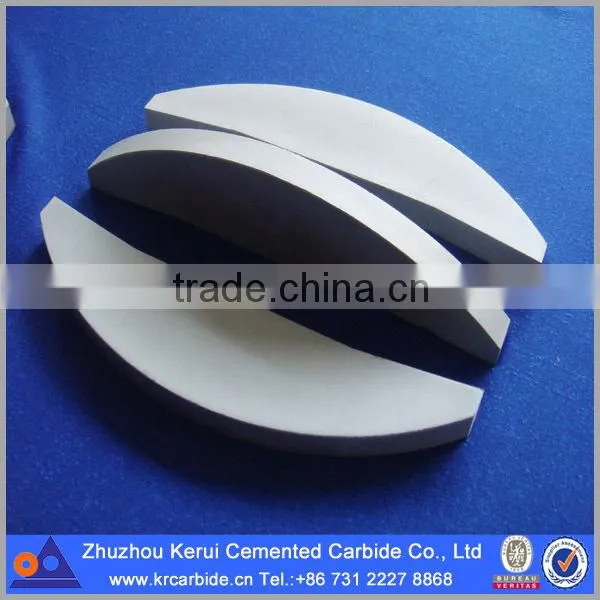 Tungsten carbide components in rotor tips for VSI crusher