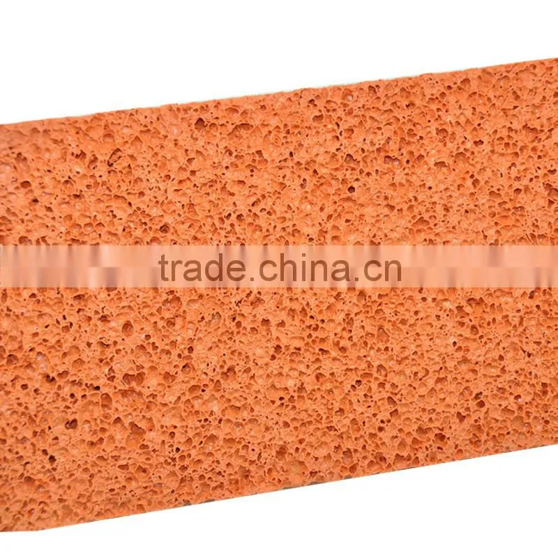 Low density orange masonry float with plastic handle
