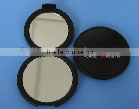 double side plastic cosmetic mirror .