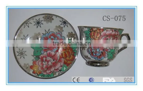 Porcelain , full decal , cup/saucer set
