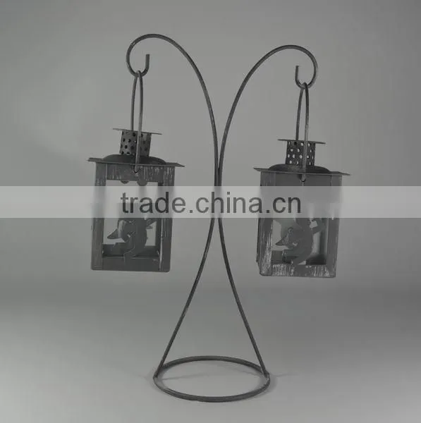 Metal stand with two angel lantern