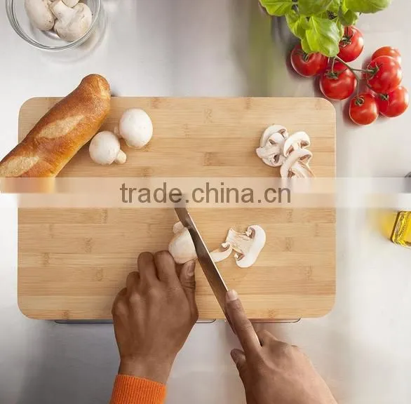 Bamboo cutting board with storage drawers