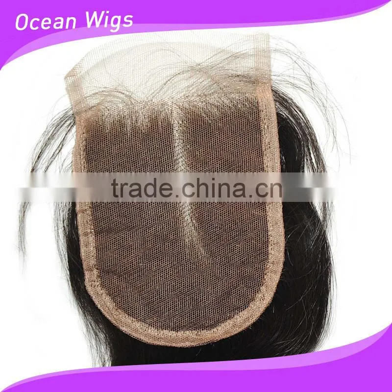 black color top closure with lignt brown lace base
