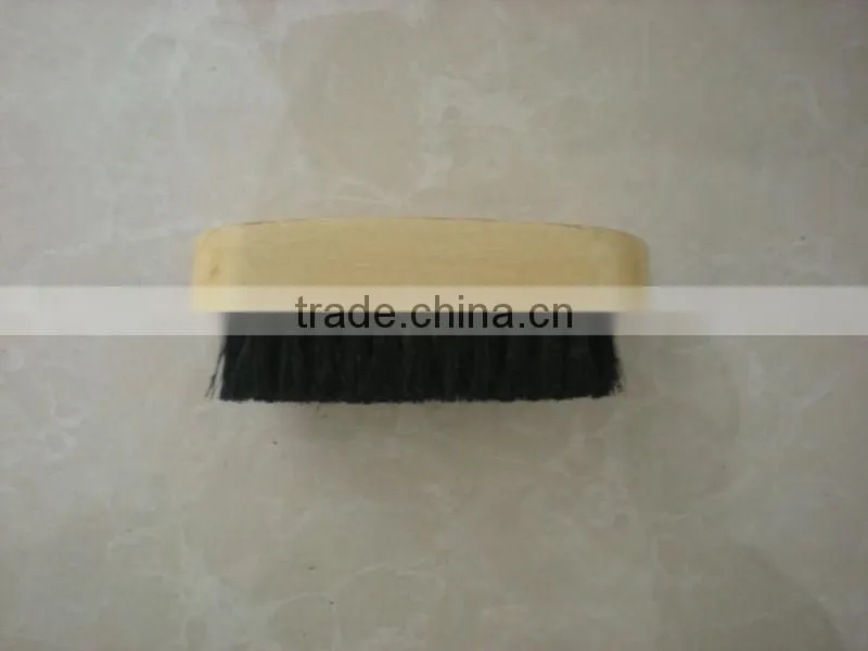 small wooden shoe brush