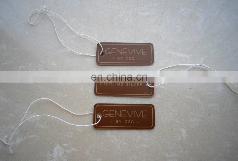 Paper tags with elastic string for clothing