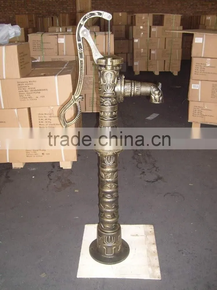 cast iron hand pump garden villiage using