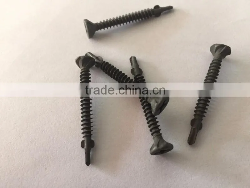 Self drilling screw with wings for steel profiles