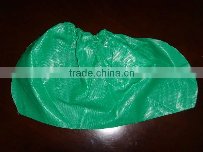 Green disposable CPE boots cover