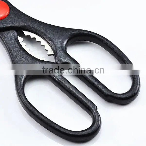 a pair of standard,large scissors extemely sharp kitchen scissor