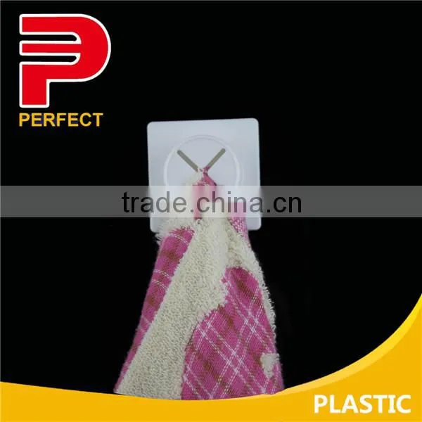 Removable self adhesive plastic towel grip