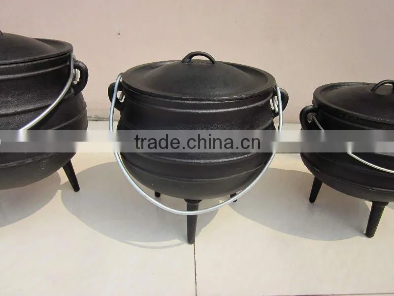 Cast iron black African three legged potjie pot