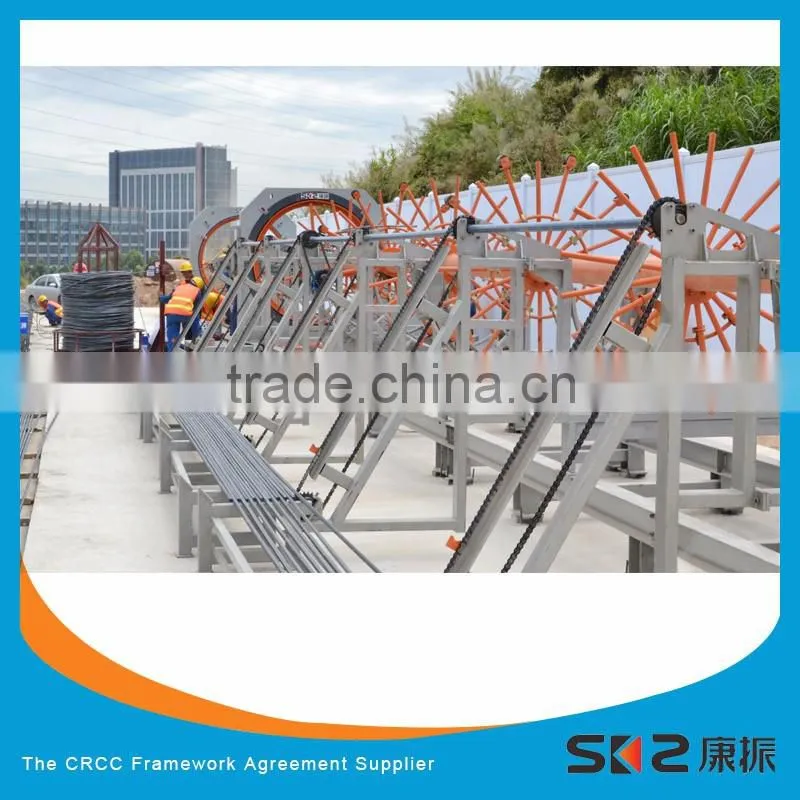 Cage assembler for the production of round cages with welded spirals and pre-set pitch