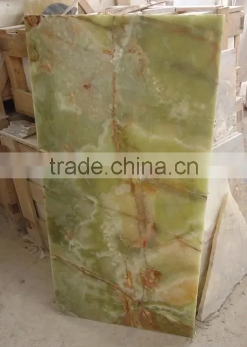 A GRADE DARK GREEN ONYX TABLE TOPS COLLECTION