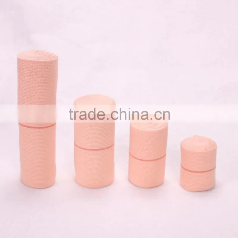 YD30017 Factory high quality ventilated soft washable plain surgical high elastic bandage(pink bandage)