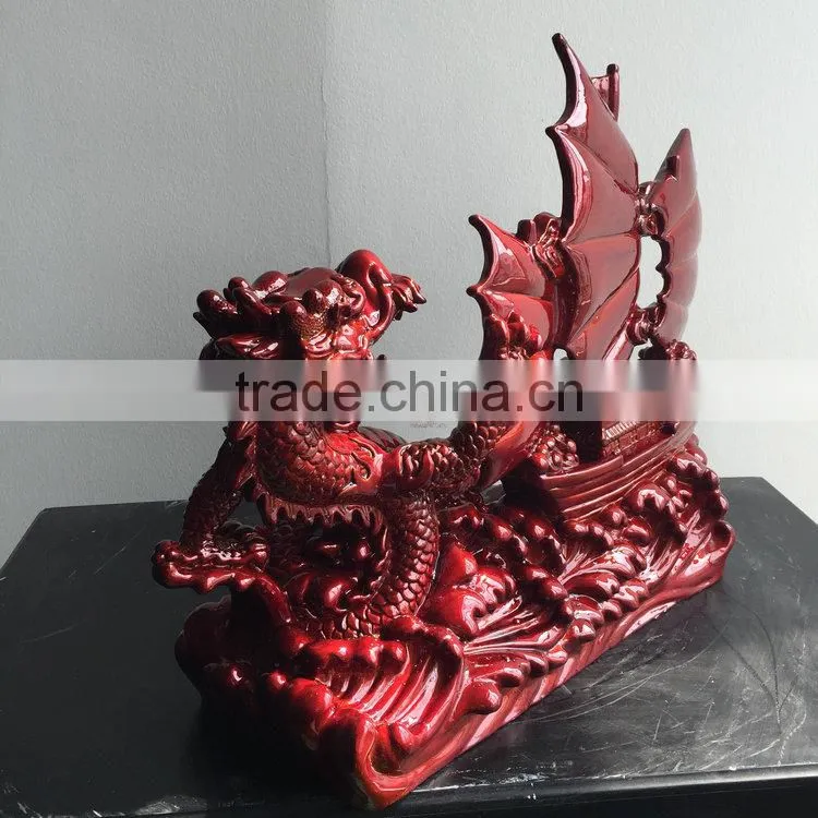 Resin sailing boat sculpture