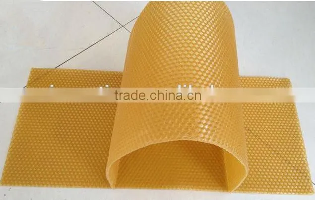 factory making beeswax foundation sheet