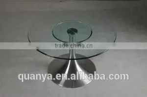Round glass table with stainless steel base