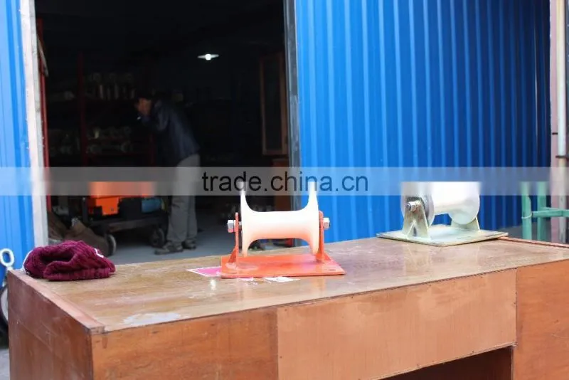 Steel plate supported flat cable ground roller,cable puller