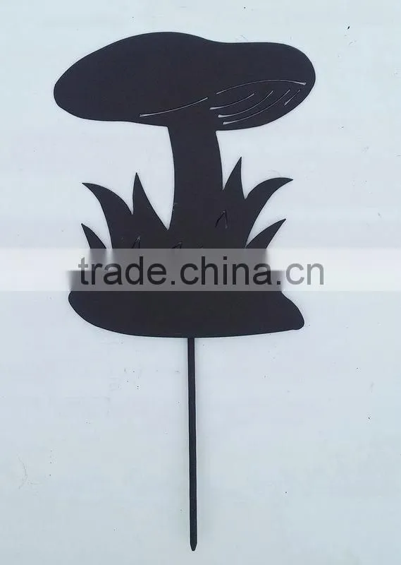 Garden stake with mushroom decoration