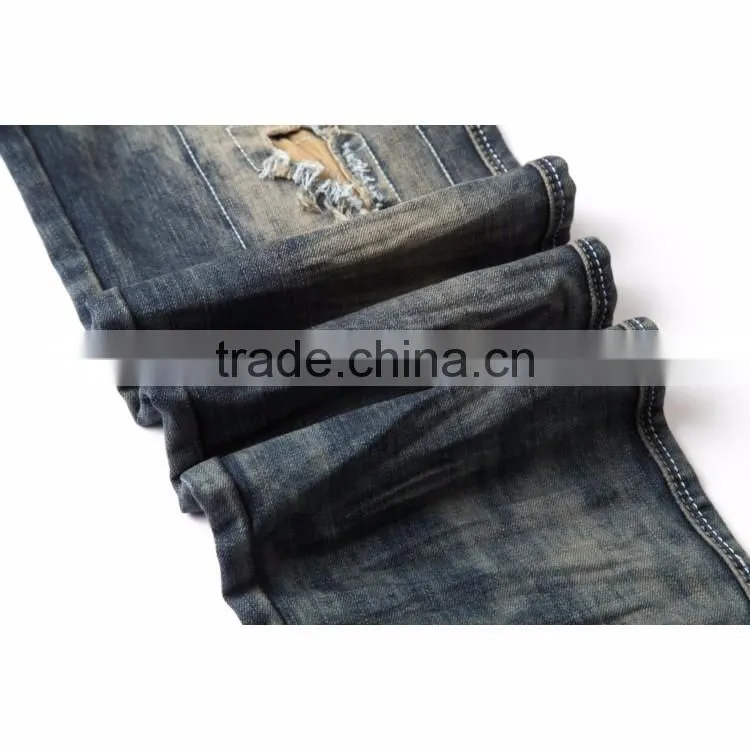 2017 Autumn customized blue daily wear hole design denim ripped denim jeans trouser