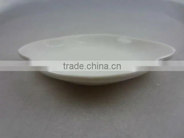 Stock white porcelain flower shaped sauce dish