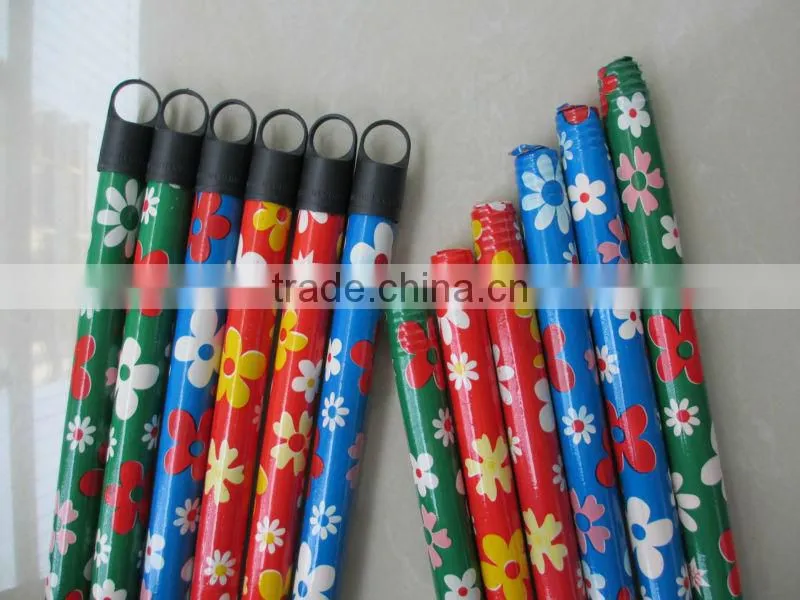 plastic covered wooden broom handle with small cap