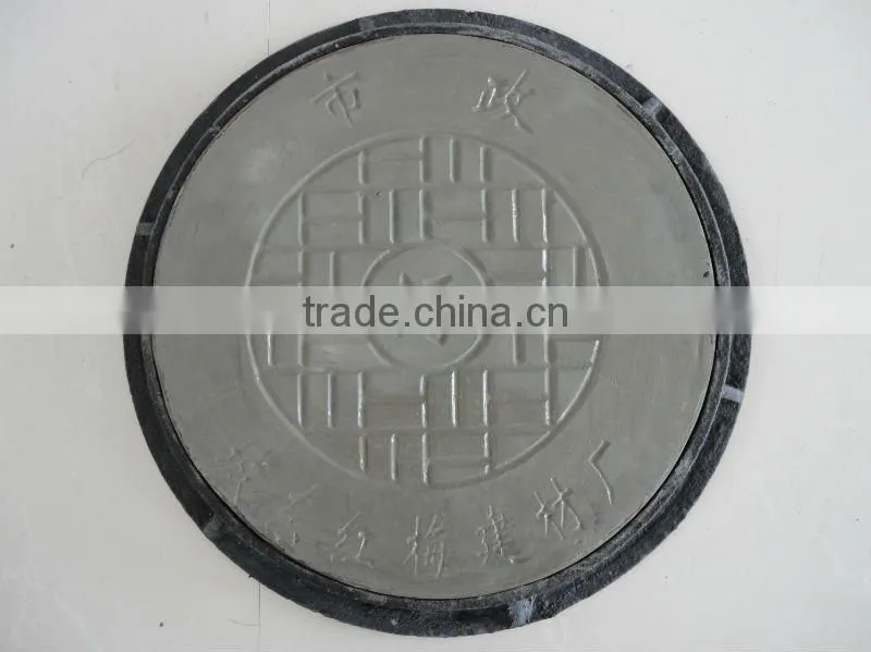 Polymer concrete manhole cover