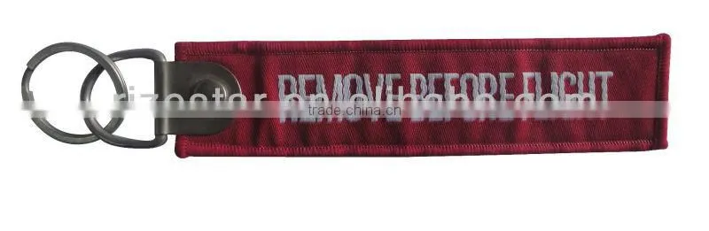 Remove before flight woven fabric keychain