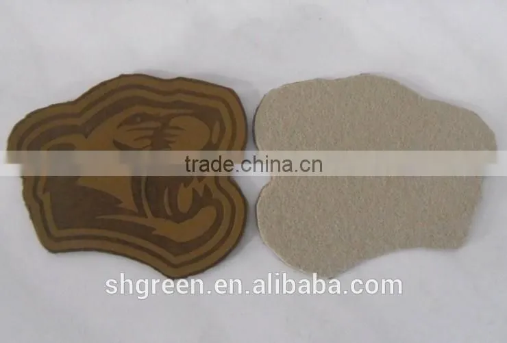 Dark brown irregular false leather label for pants