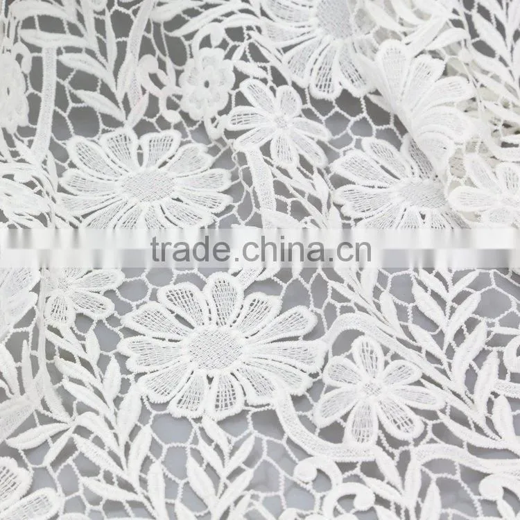 Hot sale promotional cheap embroidery supplies net dress materials fabric designs for clothes