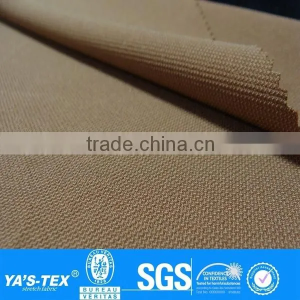 Dark Yellow Granular Sensation Polyester Spandex Fabric Absorption and fast dry For Mountaineering