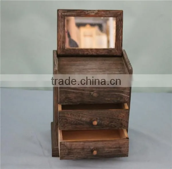 Antique small wooden cabinet with many drawers