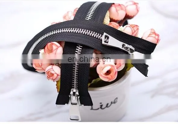 black and white double -ended light gold and white gold silver metal zipper