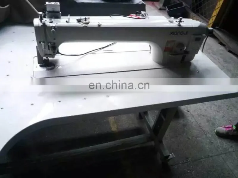 9900-D4 direct- drive long arm compound feed lockstitch sewing machine with four features