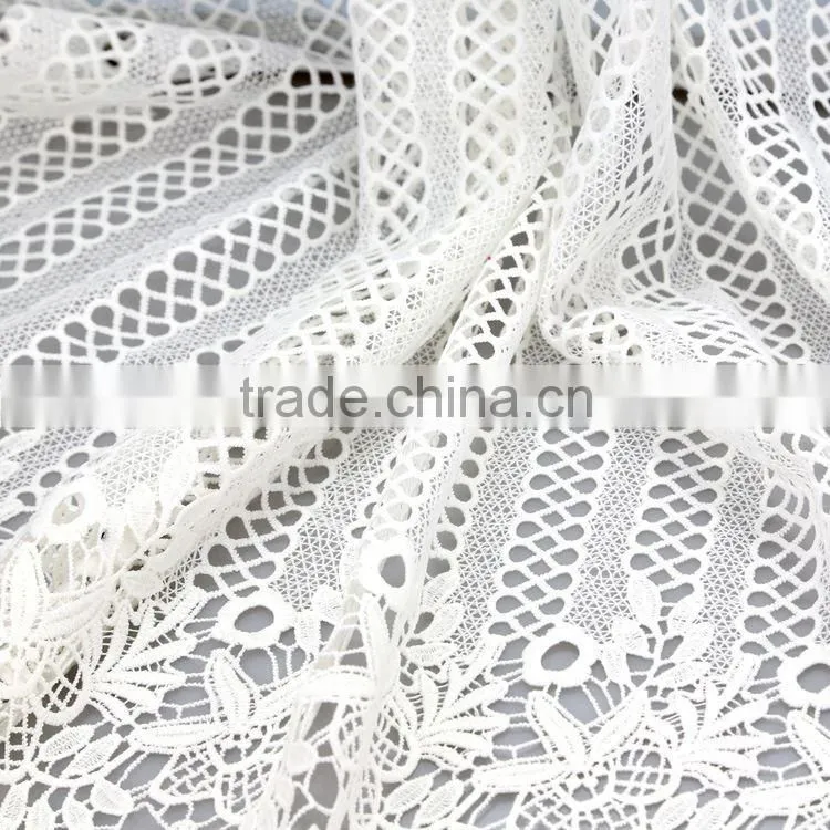 Top selling embroidery geometric latest net dress designs fabric by china embroidery factory
